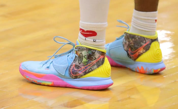 Bronny James wears Nike Kyrie shoes as he plays for Strive for Greatness in an AAU game.